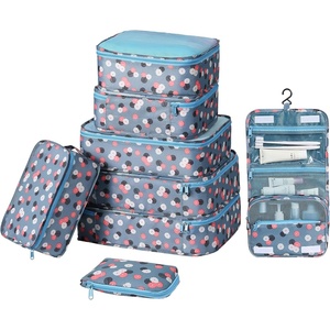 image:imageDIMJ Packing Cubes for Travel  8 Pcs Travel Cubes for Suitcase Lightweight Travel Essential Bag with Large Toiletries Bag for Clothes Shoes Cosmetics Toiletries Blue Flower